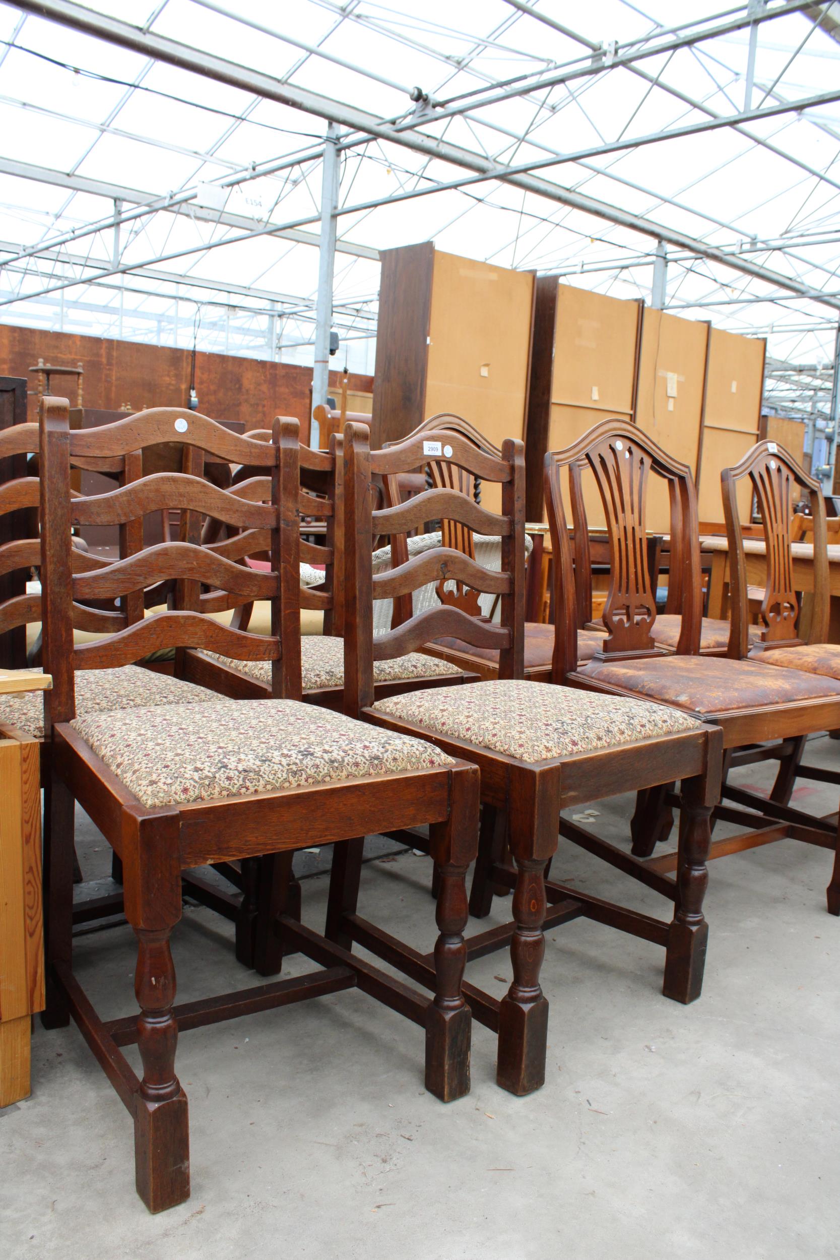 A SET OF FOUR OAK LADDER BACK DINING CHAIRS ON TURNED FRONT LEGS - Image 2 of 3