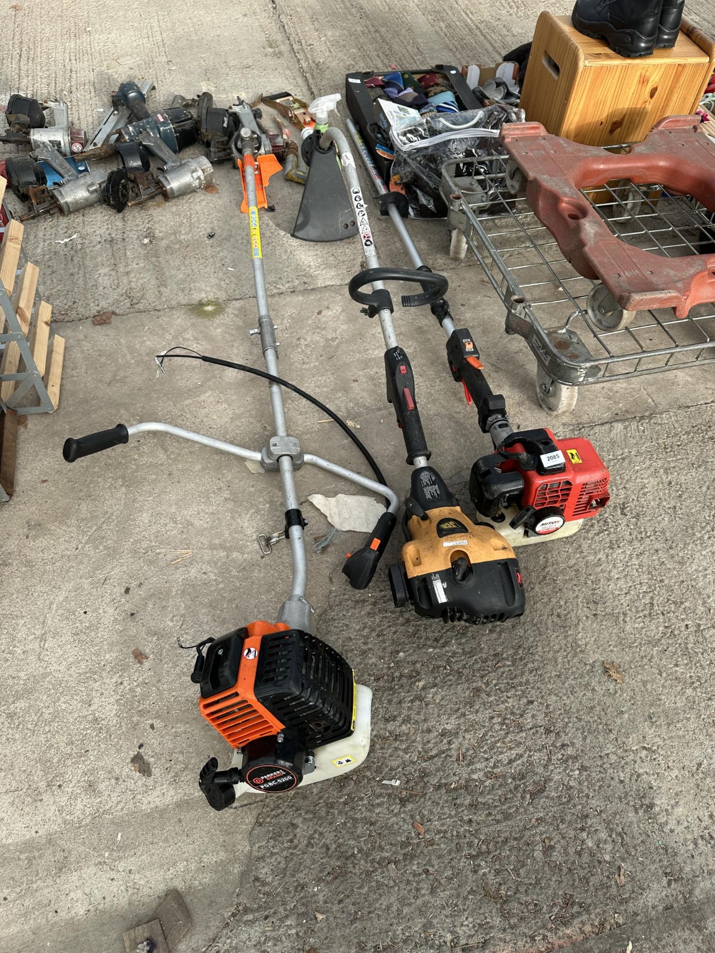 A JCB PETROL STRIMMER, A PARKSIDE STRIMMER BODY AND A MITO PETROL STRIMMER BODY