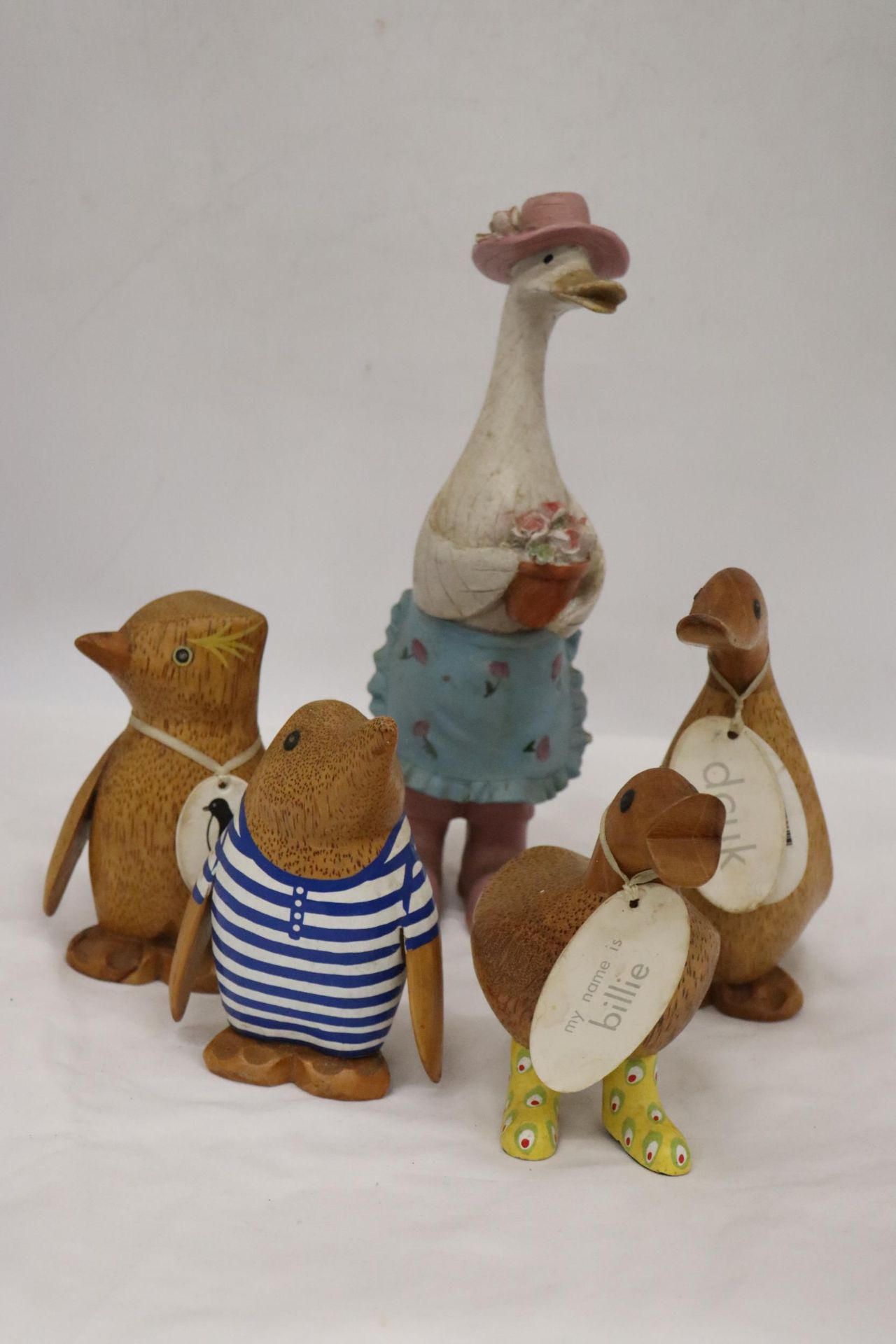 FIVE WOODEN DCUK'S TO INCLUDE GUINS PENGUIN, BILLIE, NAOMI, ETC.,