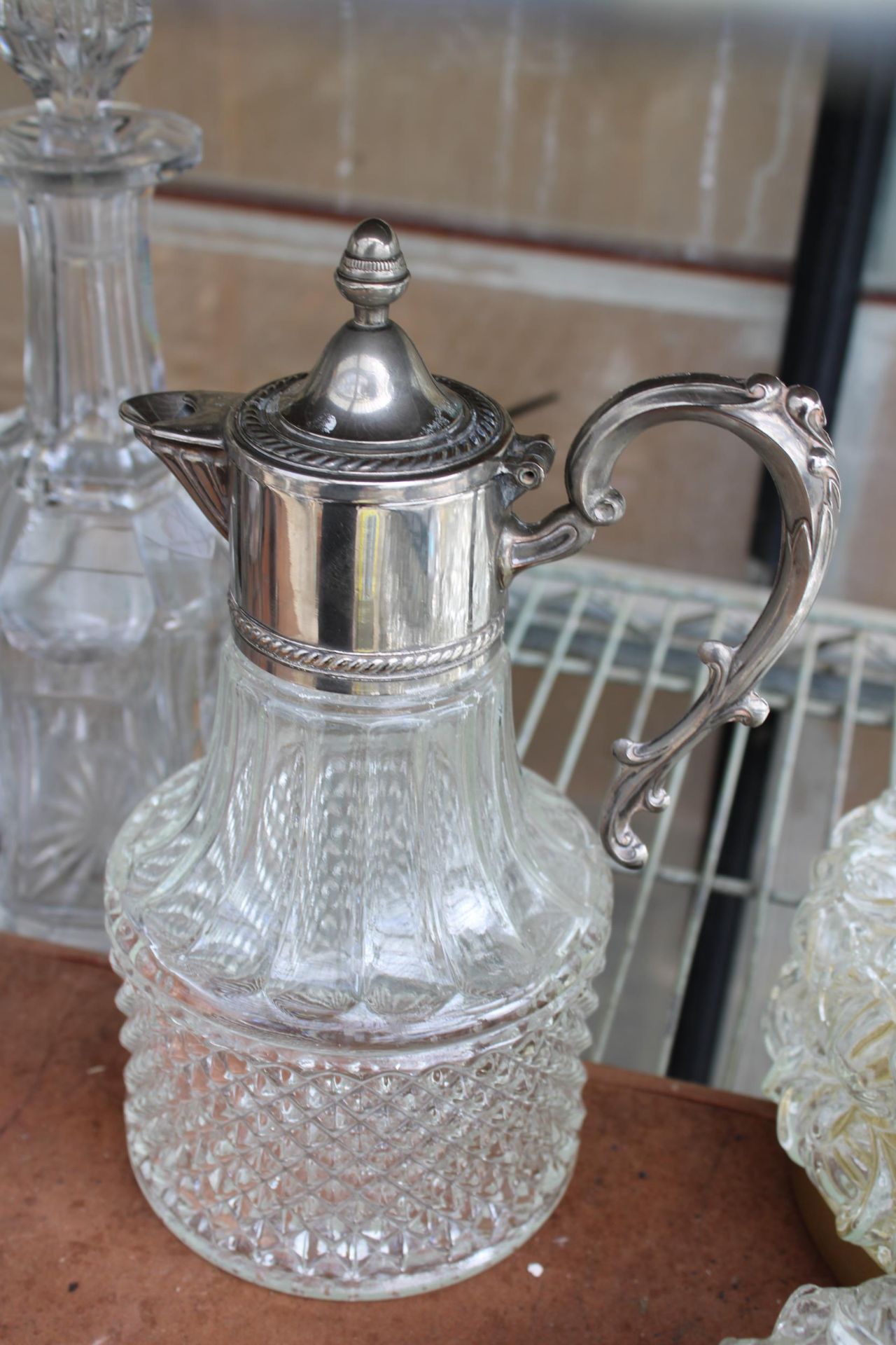 TWO GLASS DECANTORS AND A CLARET JUG WITH SILVER PLATED TOP - Image 2 of 2