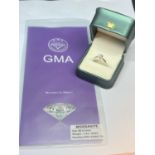 A MARKED 925 RING WITH A ONE CARAT MOISSANITE SIZE O/P COMPLETE WITH GMA MOISSANITE REPORT IN A