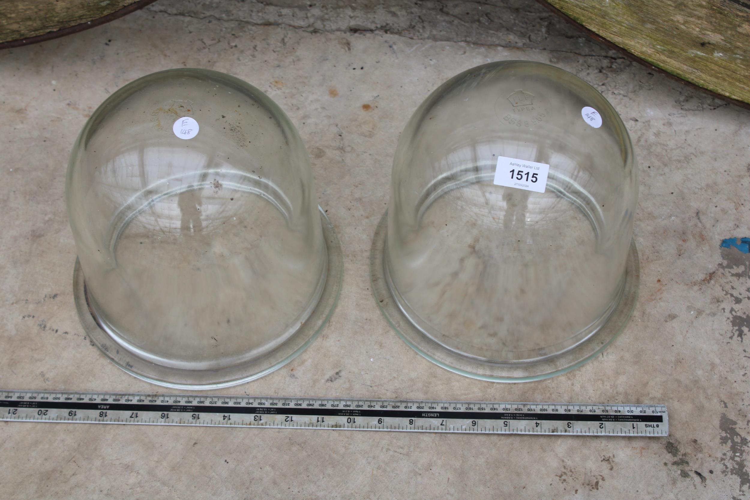 A PAIR OF VINTAGE GLASS DISPLAY DOMES BEARING THE MARK FLP TYPEA