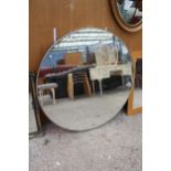 A MODERN METAL FRAMED WALL MIRROR 47" DIAMETER