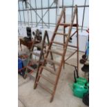 TWO VINTAGE WOODEN STEP LADDERS