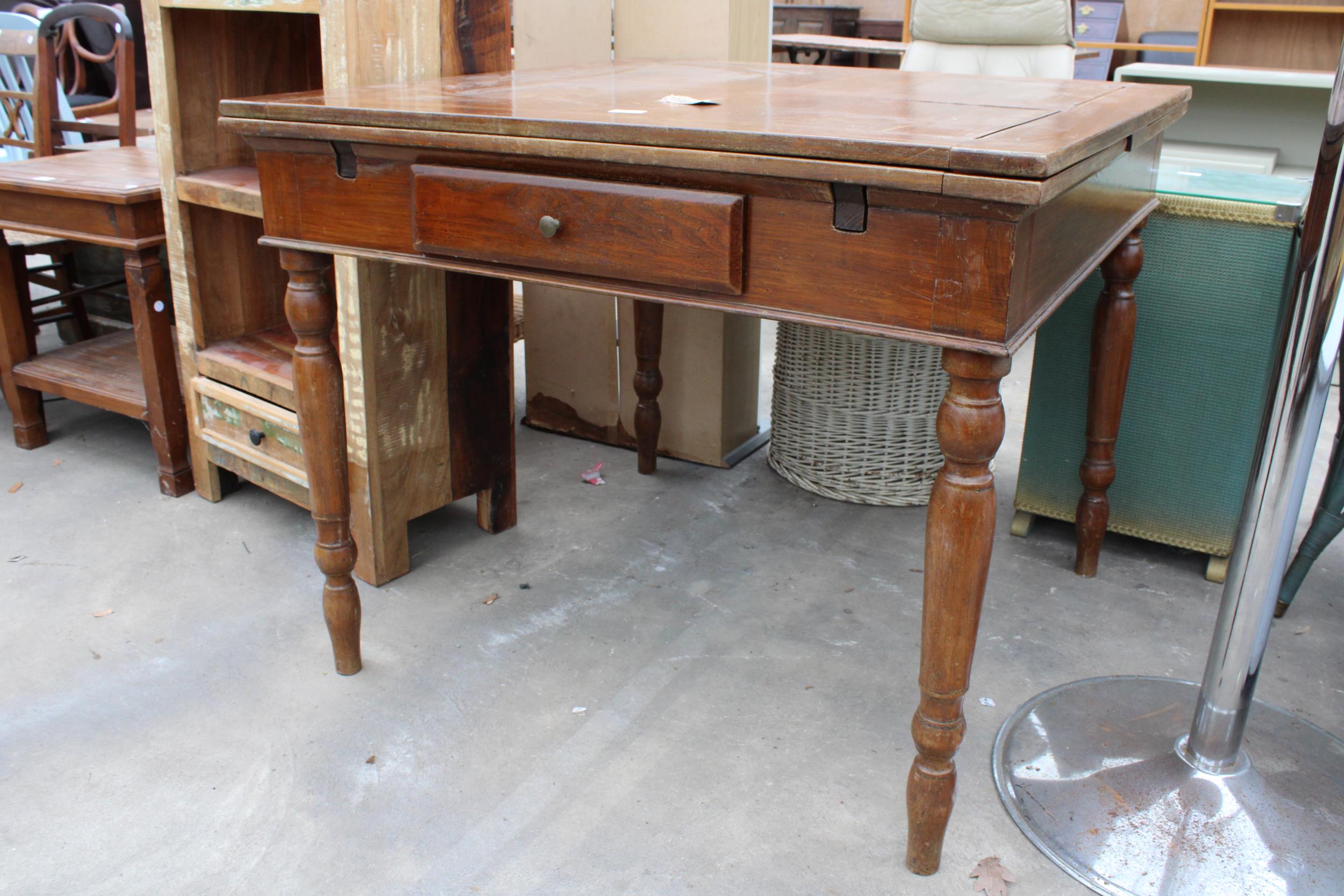 A MID 20TH CENTURY OAK AND BEECH DRAW LEAF DINING TABLE - Image 2 of 2