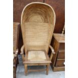 A HOODED OAK FRAMED ORKNEY CHAIR WITH WICKER SEAT AND STITCHED STRAW BACK, STAMPED D M KIRKNESS,