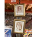 A PAIR OF SEMI EROTIC FRAMED PRINTS WITH INDISTINCT SIGNATURE
