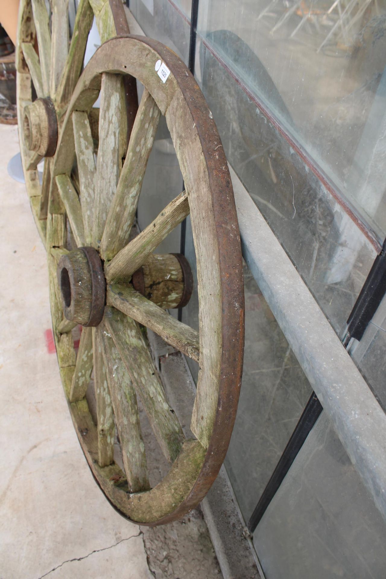 A VINTAGE WOODEN AND METAL BANDED CART WHEEL (D:120CM) - Image 2 of 2