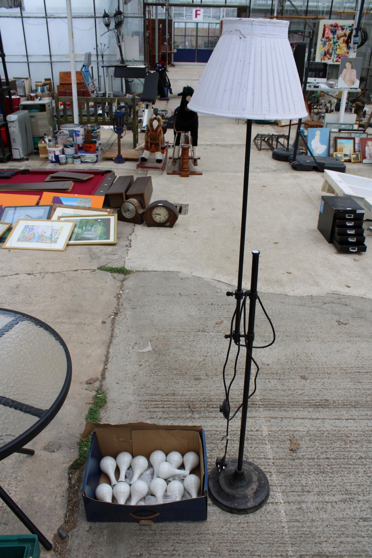 A METAL STANDARD LAMP AND CERMIC BUD VASES