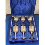 A SET OF SIX SILVER PLATED GOBLETS IN A PRESENTATION BOX