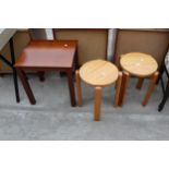 A PAIR OF PINE STACKING STOOLS AND A LAMP TABLE