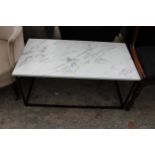 A MARBLE EFFECT COFFEE TABLE ON A METALWORK FRAME 36" X 19"