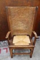 AN OAK ORKNEY CHAIR OF SMALL PROPORTIONS WITH WICKER SEAT AND STITCHED STRAW BACK