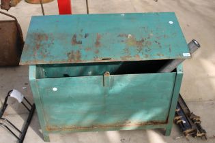 A METAL LIDDED STORAGE BIN AND A DROP DOWN CAR PARK BOLLARD