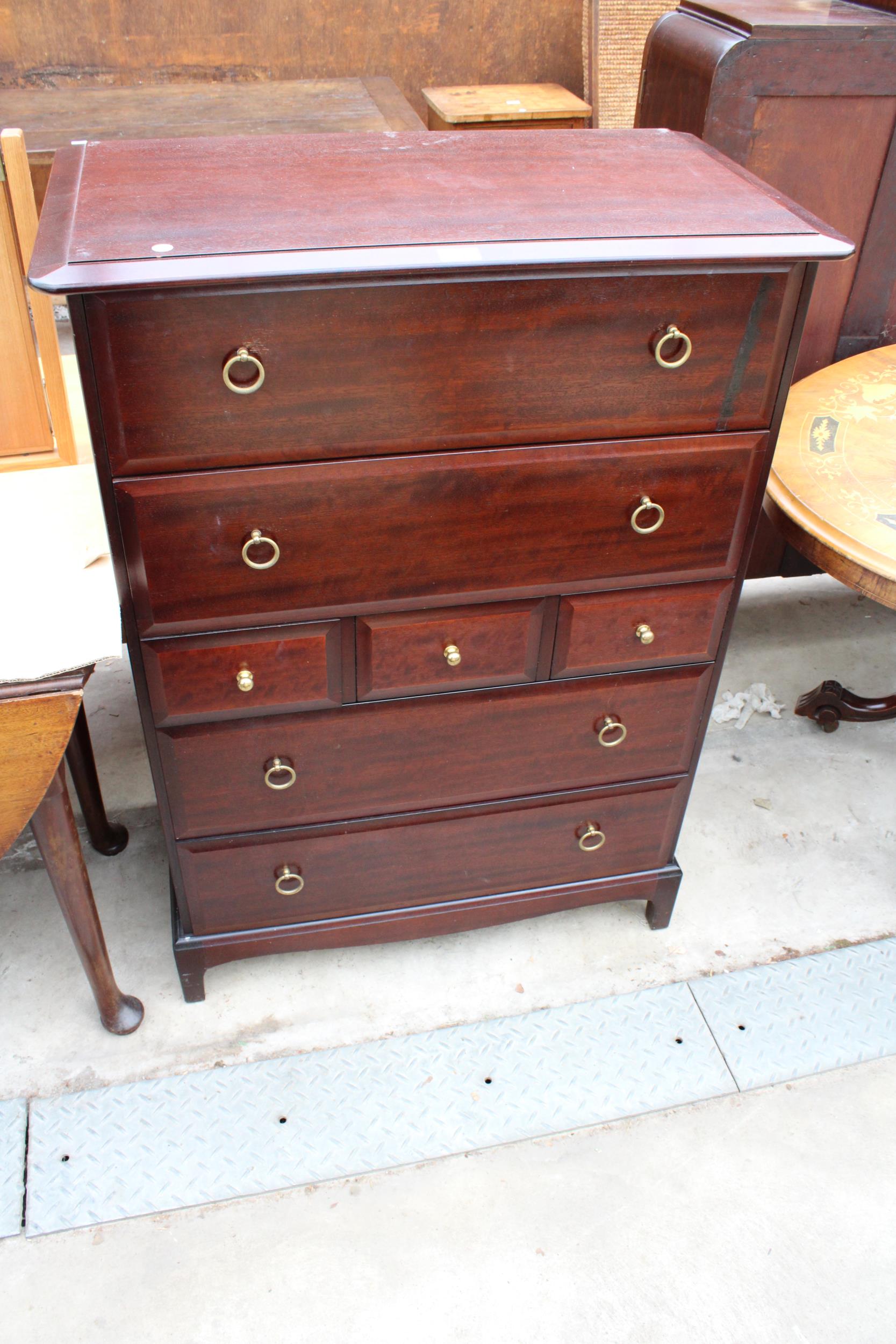 A STAG MINSTREL CHEST OF THREE SHORT AND FOUR LONG DRAWERS, 32" WIDE