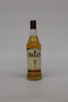 A 70CL BOTTLE OF BELLS FINE WHISKY