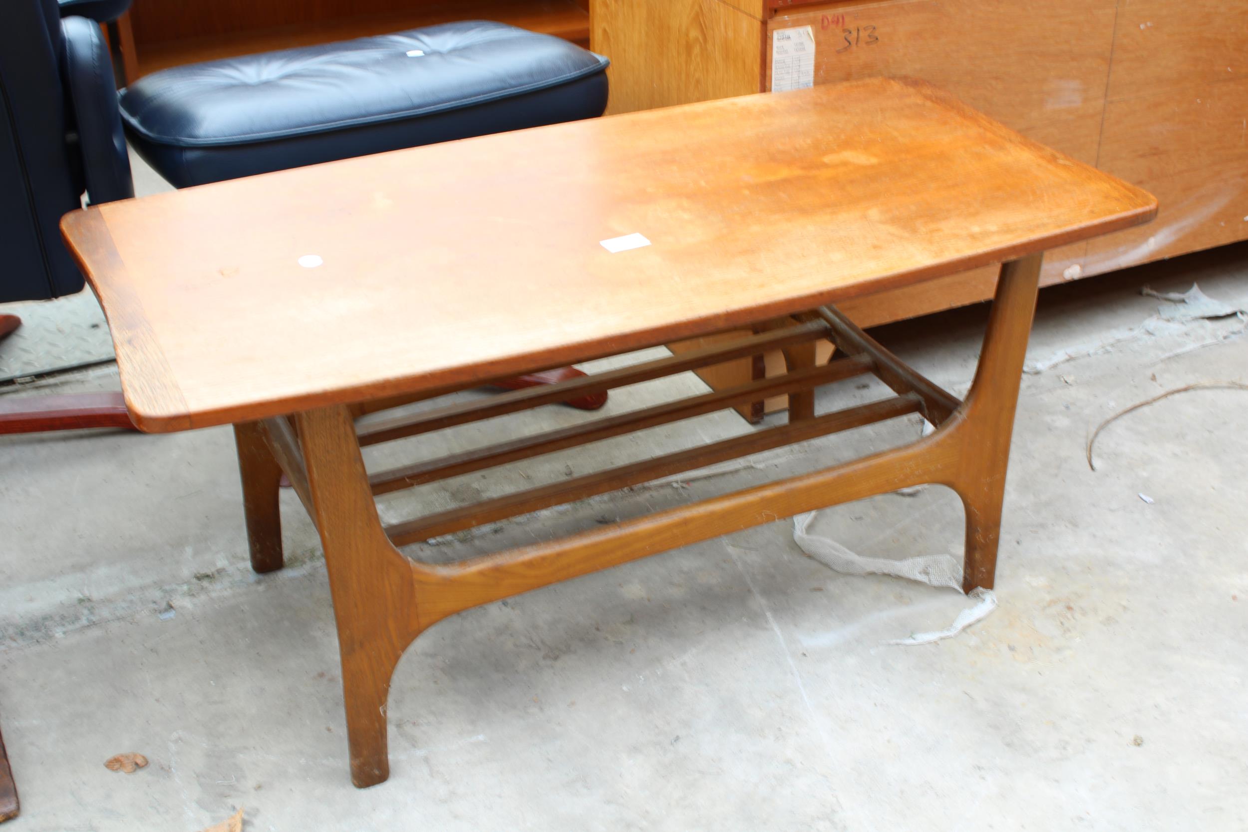 A RETRO TEAK TWO TIER COFFEE TABLE