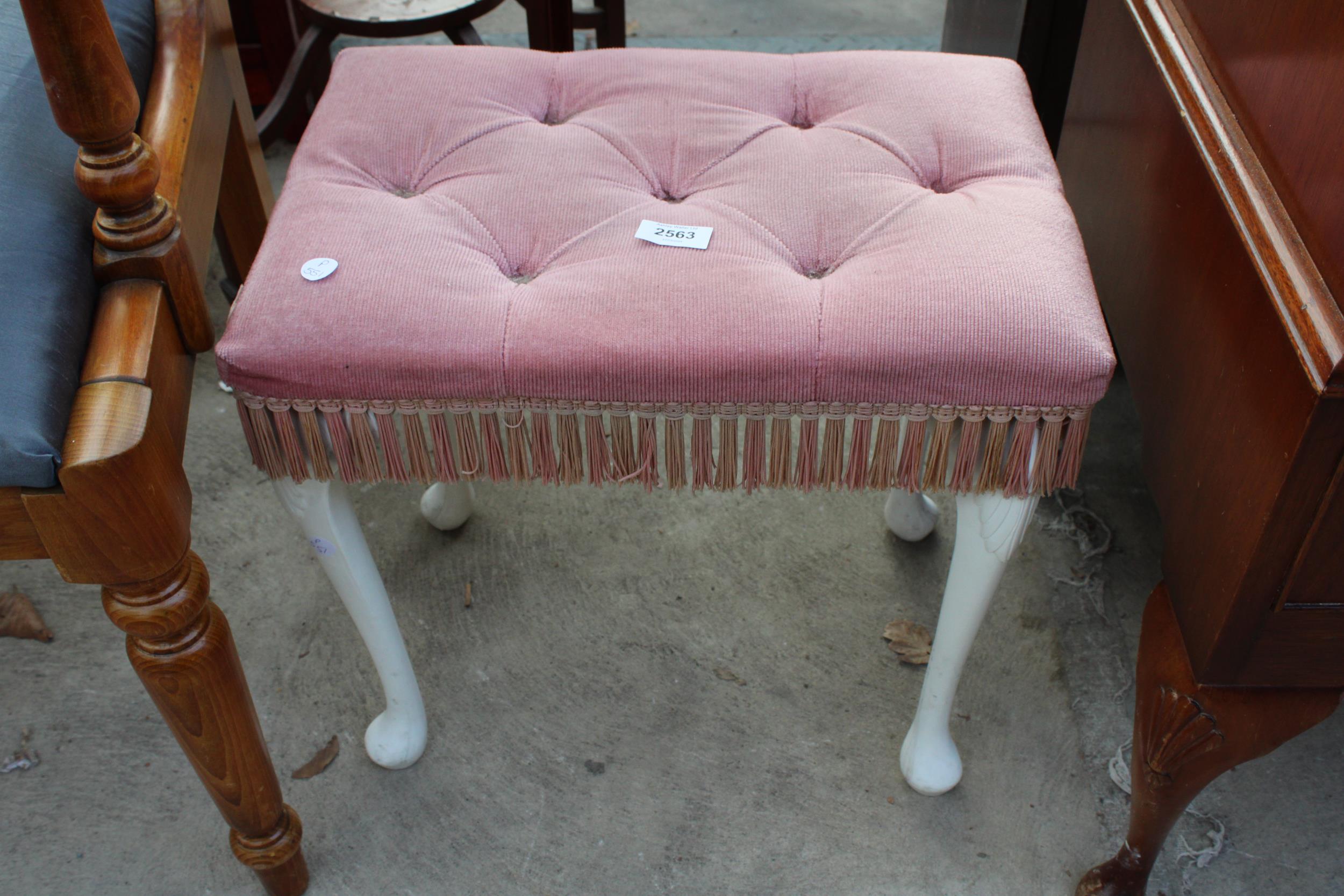 A MODERN PINK STOOL ON CABRIOLE LEGS