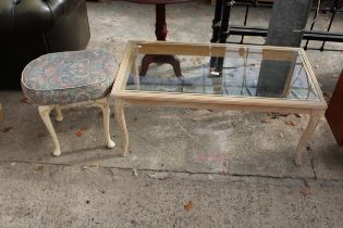 A LIMED COFFEE TABLE WITH GLASS TOP AND A STOOL ON CABRIOLE LEGS