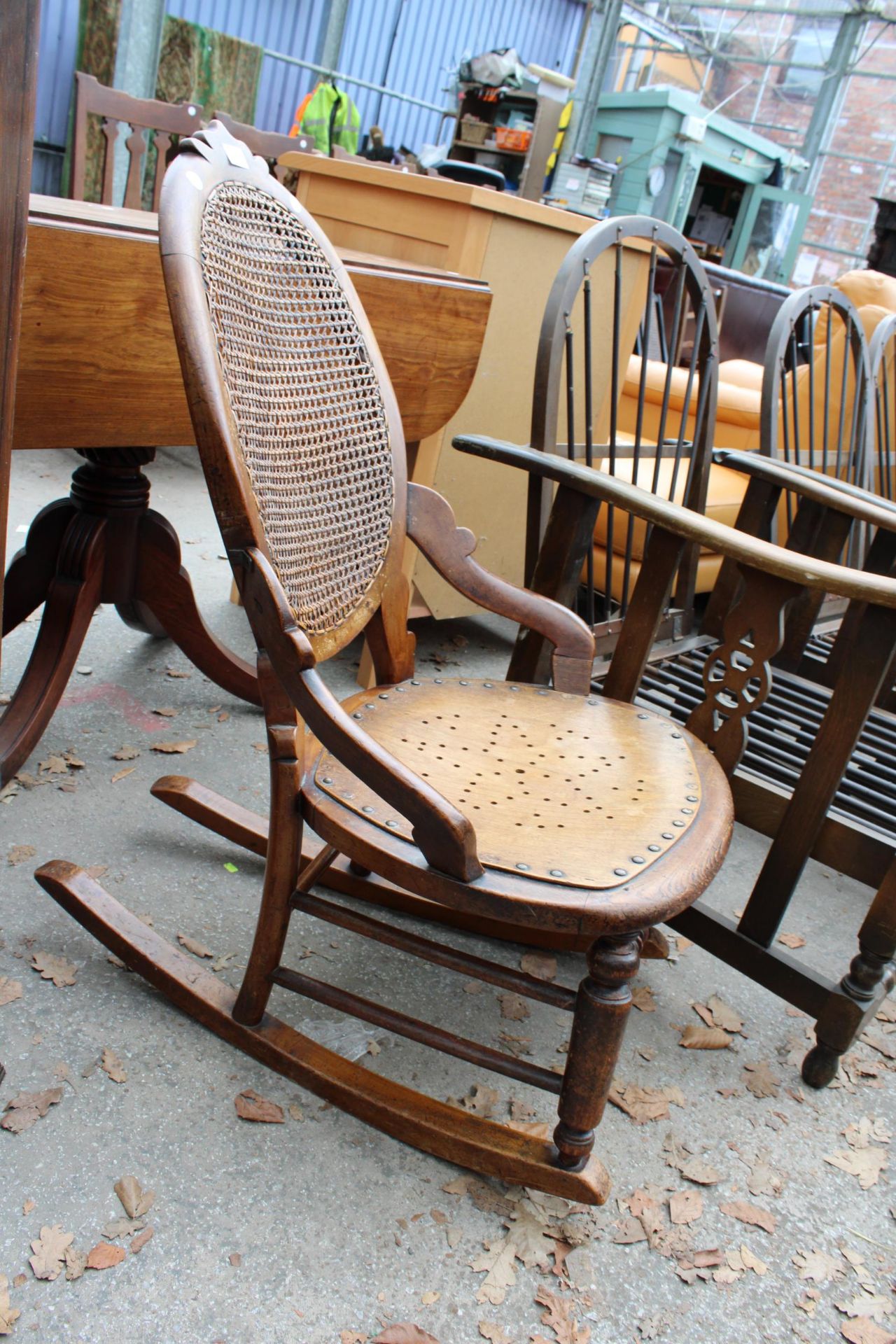 A VICTORIAN SATINWOOD ROCKING CHAIR WITH SPLIT CANE BACK - Image 2 of 2