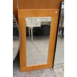 AN OAK FRAMED MIRROR - 35" X 20"