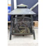 A METAL GARDEN FIRE PIT