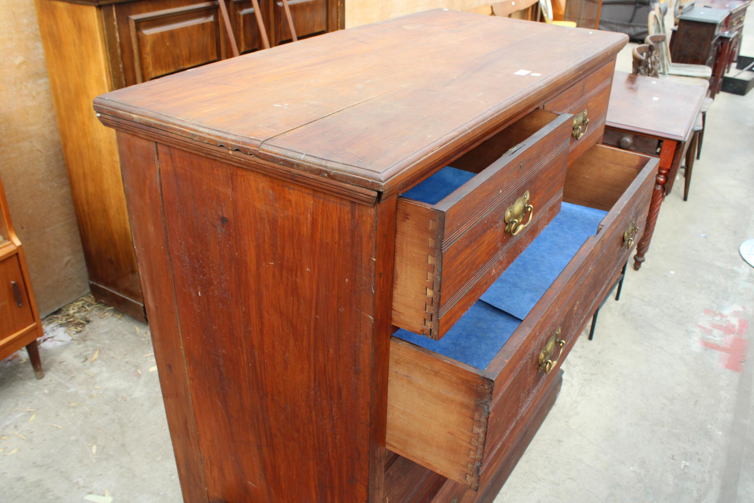 A LATE VICTORIAN PINE AND BEECH CHEST OF TWO SHORT AND THREE LONG DRAWERS 48" WIDE - Image 2 of 3