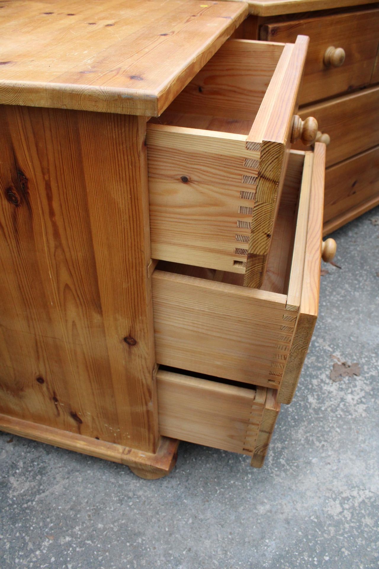 A PINE CHEST OF TWO SHORT AND TWO LONG DRAWERS 31.5" WIDE AND A PAIR OF MATCHING BEDSIDE CHESTS - Image 2 of 2