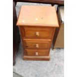 A PINE BEDSIDE CHEST