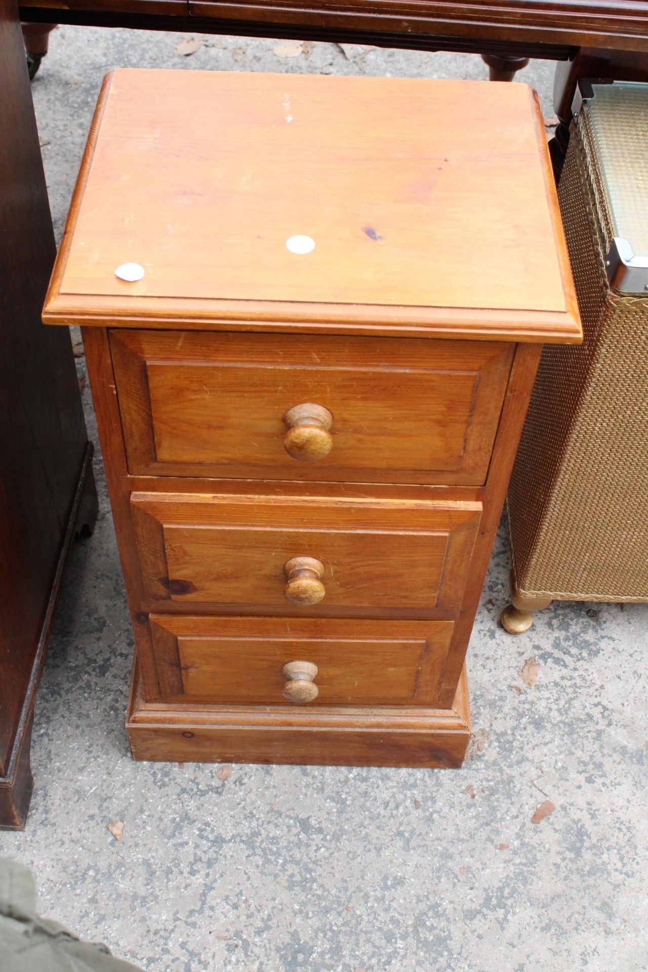 A PINE BEDSIDE CHEST