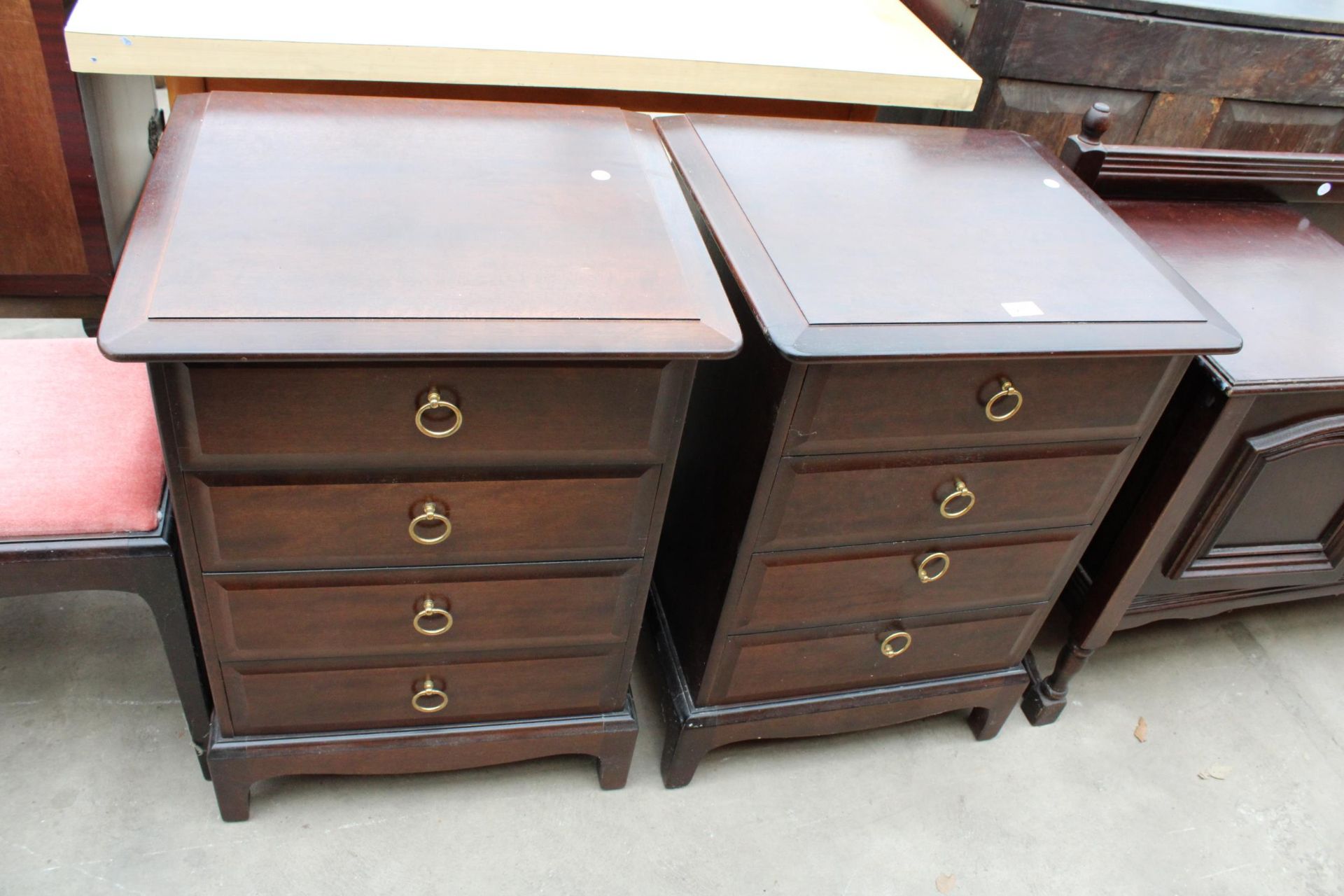 A PAIR OF STAG MINSTREL CHEST OF FOUR DRAWERS 21" WIDE EACH