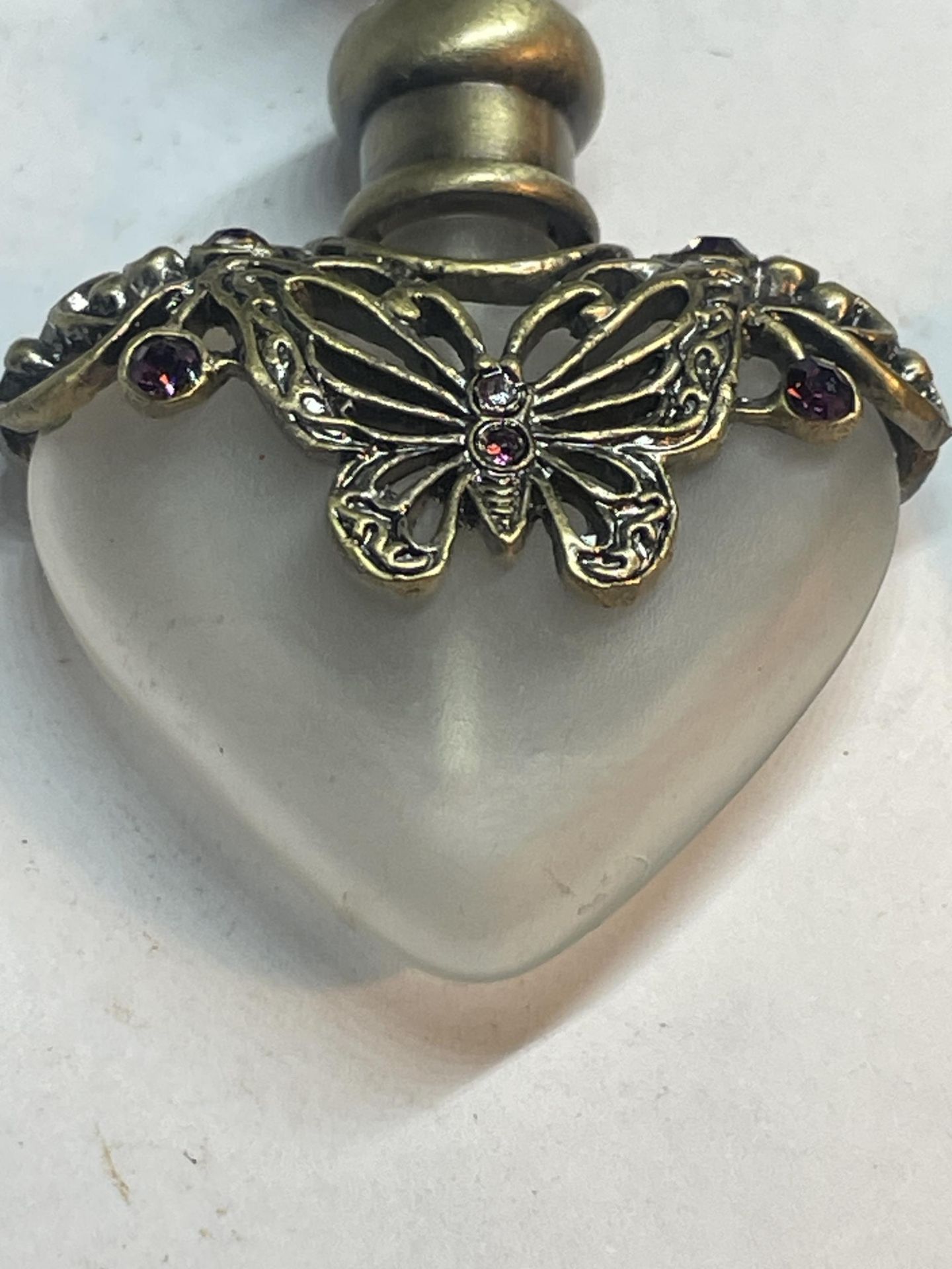 TWO GLASS PERFUME BOTTLES WITH METAL BUTTERFLY DESIGN - Image 2 of 4