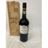 A 75CL BOTTLE OF NOVAL 10 YEAR OLD TAWNY PORT IN A WOODEN BOX