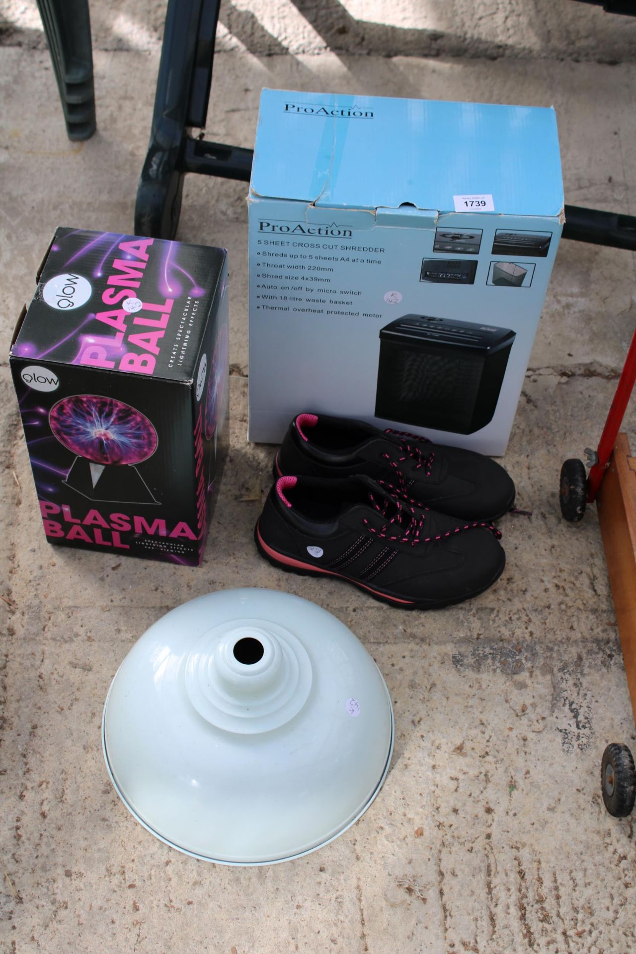 AN ASSORTMENT OF ITEMS TO INCLUDE TRAINERS, A PLASMA BALL AND A PAPER SHREDDER ETC