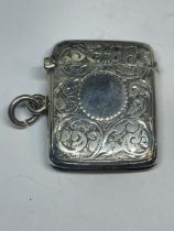 A HALLMARKED BIRMINGHAM SILVER VESTA CASE