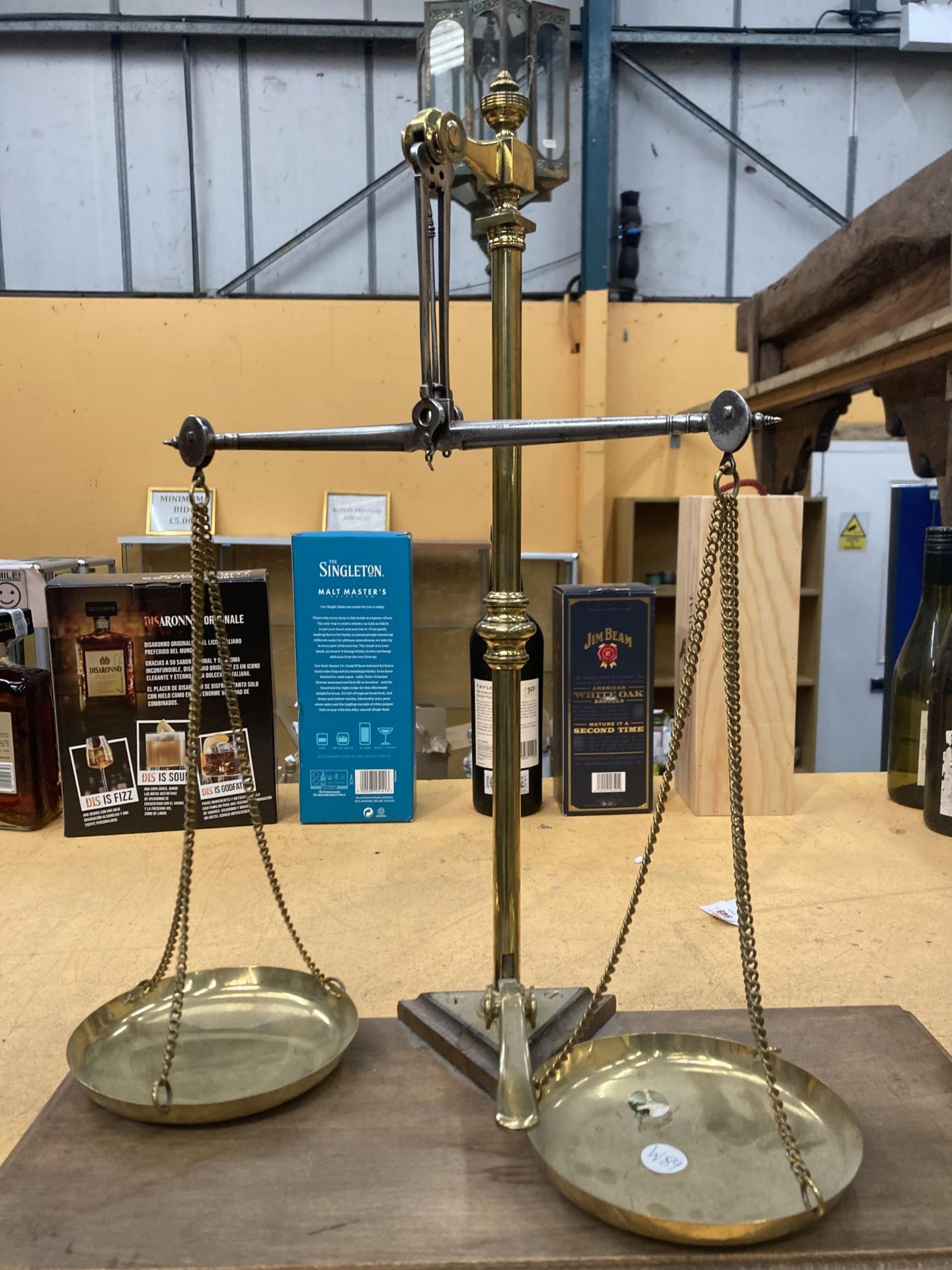 A SET OF BRASS BALANCE SCALES ON A WOODEN BASE - Image 2 of 3