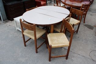 A CHARLOTTE PERRIAND STYLE DINING TABLE 43" DIAMETER (LEAF14") AND SIX MERIBEL STYLE DINING CHAIRS