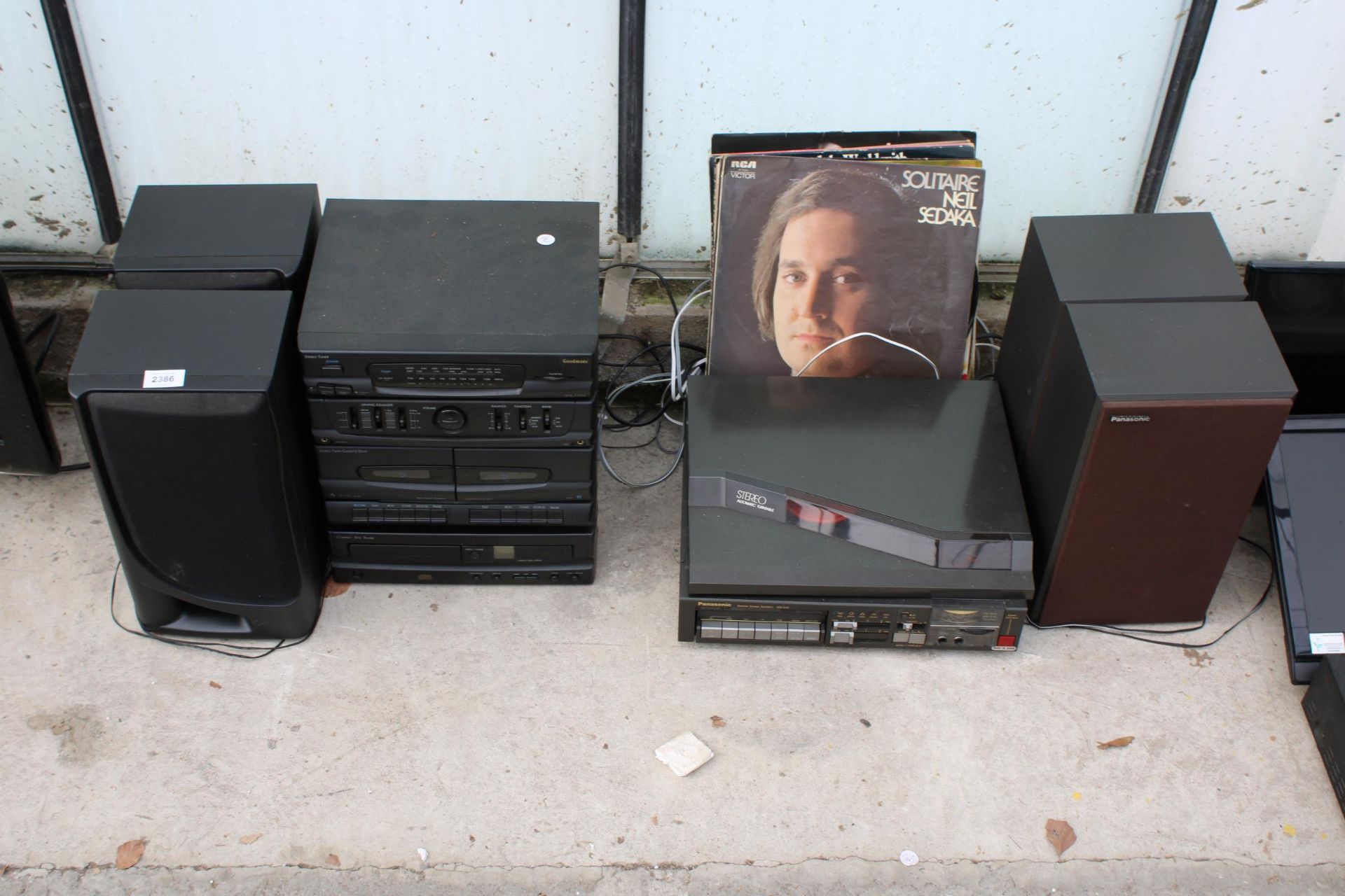 A GOODMANS STEREO STACK WITH CD, TAPE AND RADIO COMPLETE WITH TWO SPEAKERS AND PANASONIC