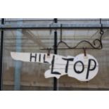 A VINTAGE WOODEN HAND PAINTED 'HILLTIOP' SIGN WITH CAST IRON HANGING BRACKET