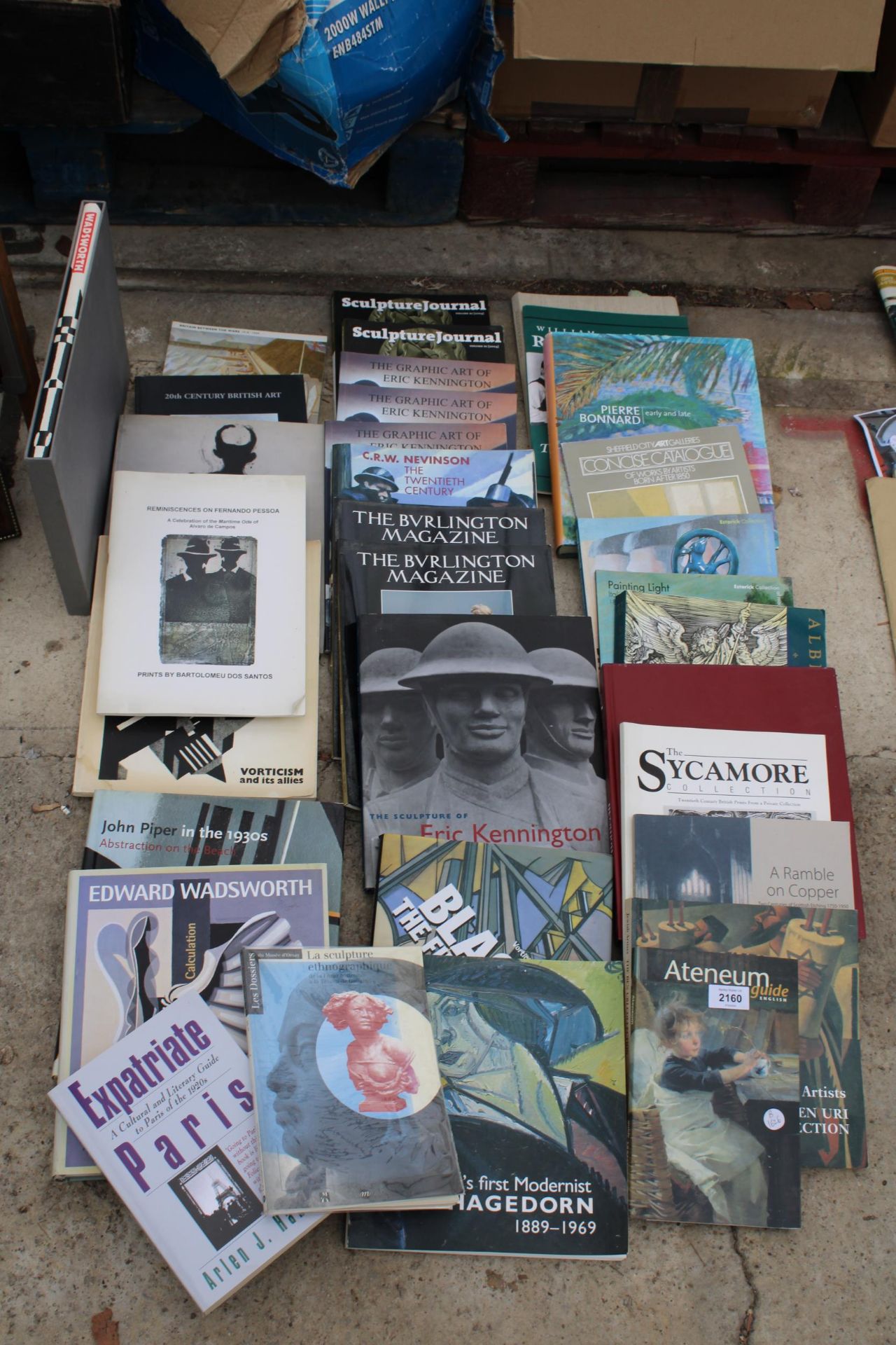 A LARGE ASSORTMENT OF BOOKS AND MAGAZINES