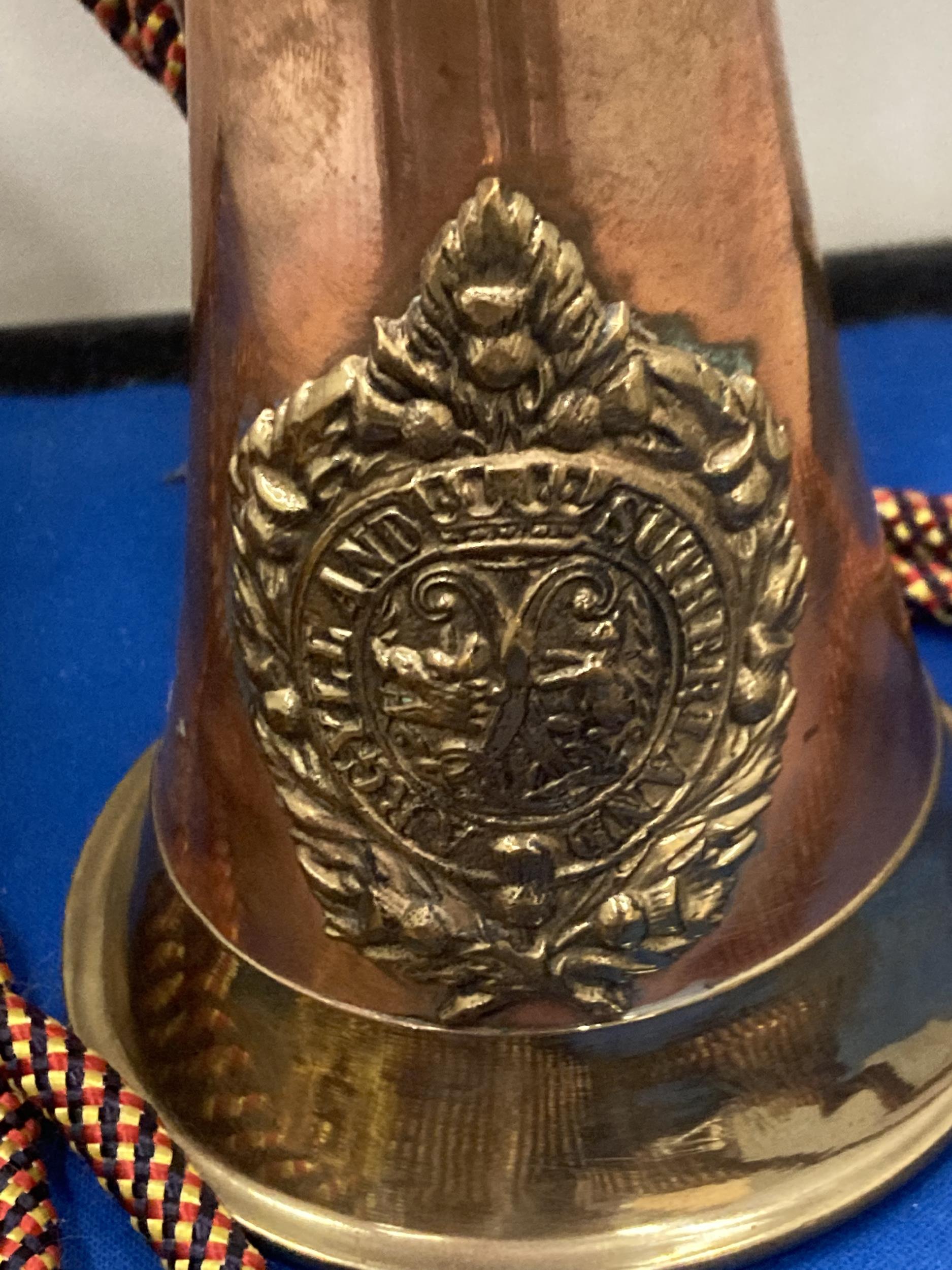 A BRASS AND COPPER 20TH CENTURY BUGLE WITH AN ARGYLE AND SUTHERLAND REGIMENTAL CREST AND CORD - Image 3 of 5