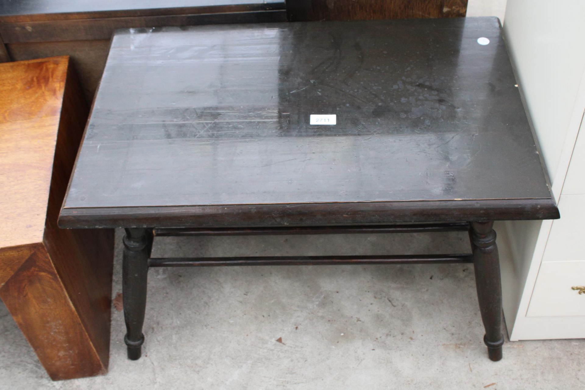 A BEECH COFFEE TABLE WITH MAGAZINE SHELF