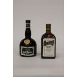 A 70CL BOTTLE OF COINTREAU LIQUEUR SPECIALITE AND A BOTTLE OF CREME DE GRAND MARNIER LIQUEUR