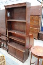 A MID 20TH CENTURY FOUR TIER SECTIONAL MINTY BOOKCASE WITH CUPBOARDS TO BASE 35" WIDE