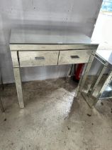 A MIRRORED CONSOLE TABLE WITH TWO DRAWERS (FROM A DEVELOPER'S SHOW HOME - BELIEVED UNUSED)