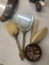 A VINTAGE PETIT POINT DRESSING TABLE SET TO INCLUDE BRUSHES, A COMB, HAND MIRROR AND TRINKET POT