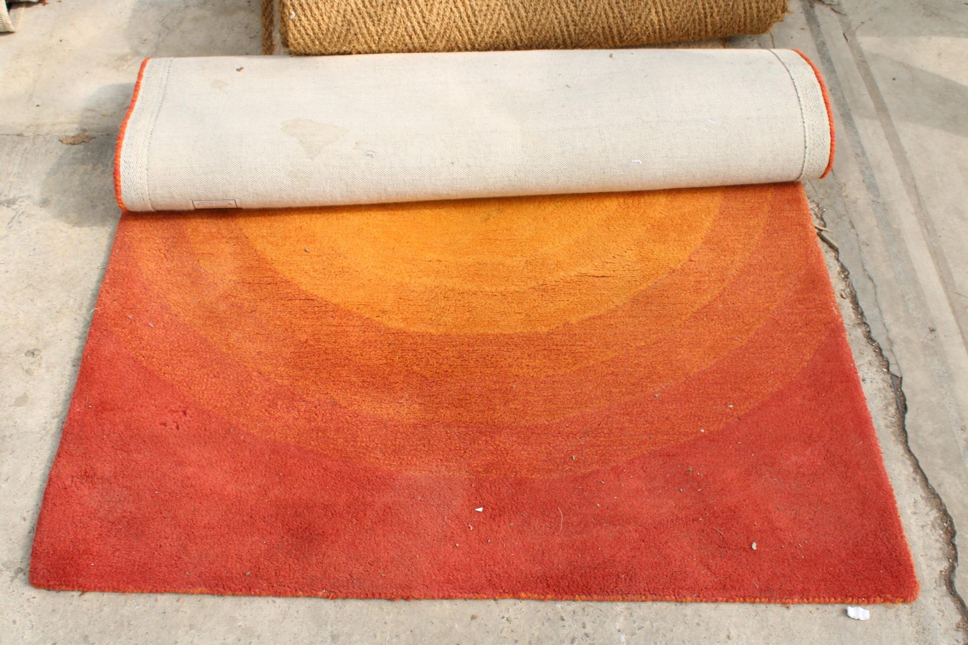 A MODERN ORANGE RUG - Image 2 of 2