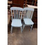 A PAIR OF PAINTED VICTORIAN KITCHEN CHAIRS