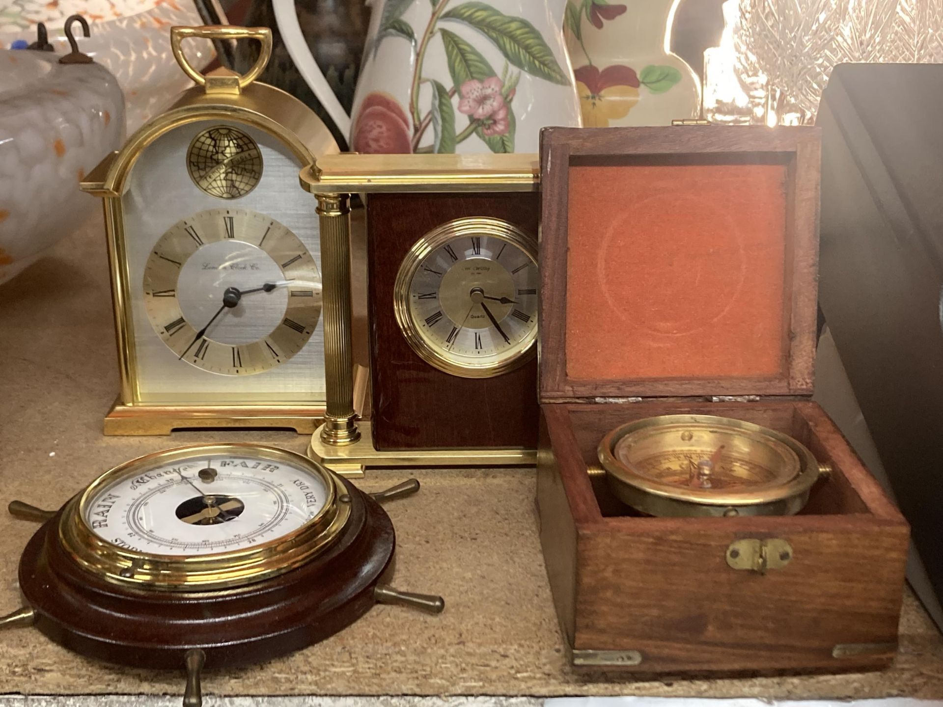 A MIXED LOT TO INCLUDE TWO CLOCKS A VINTAGE SHORTLANDS SHIP WHEEL BAROMETER PLUS BOXED COMPASS