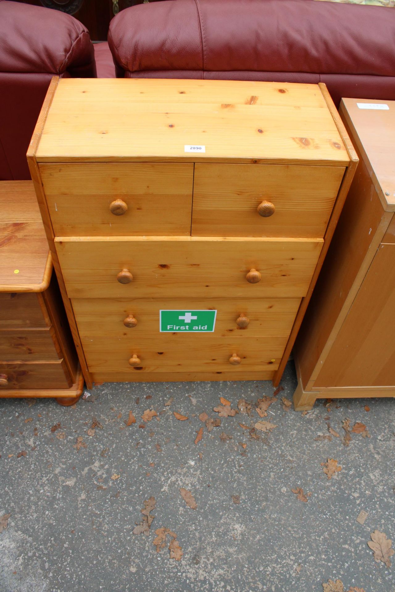 A PINE CHEST OF TWO SHORT AND THREE LONG DRAWERS 24.5" WIDE